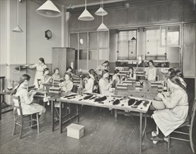 Hair dressing class, Barrett Street Trade School for Girls, London, 1915. Artist: Unknown.