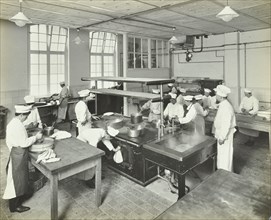 Male cookery students at work in the kitchen, Westminster Technical Institute, London, 1910. Artist: Unknown.