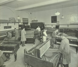 Piano repairing class, Northern Polytechnic, London, 1930. Artist: Unknown.