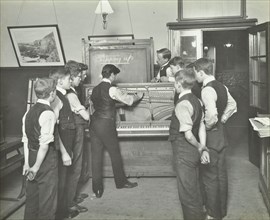 Constructing a piano, Benthal Road Evening Institute, London, 1914. Artist: Unknown.