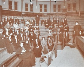 Men and women attending a literature class, Hackney Downs Secondary School, London, 1908. Artist: Unknown.