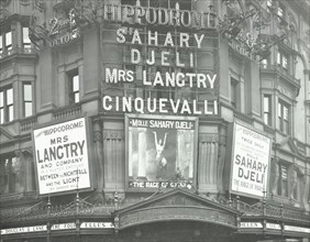 Illuminated advertisements on the front of The Hippodrome, Charing Cross Road, London, 1911. Artist: Unknown.