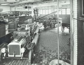 Fire engines and equipment at Cannon Street Fire Station, City of London, 1913. Artist: Unknown.