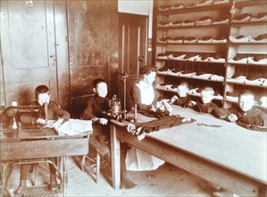 Boys sewing at the Boys Home Industrial School, London, 1900. Artist: Unknown.