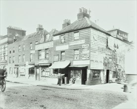 Weatherboard houses and shops on the Albert Embankment, Lambeth, London, 1900. Artist: Unknown.