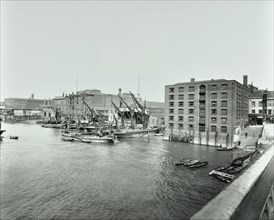 Boats and warehouses on the River Thames, Lambeth, London, 1906. Artist: Unknown.