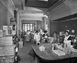 Women packing groceries at the National Food Fund building, London, February 1915