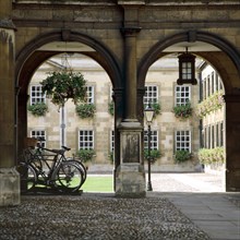 View of the arcade with bicycles, Peterhouse College, Cambridge, Cambridgeshire