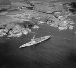 HMS 'Warspite' aground in Prussia Cove, Cornwall, May 1947.   Artist