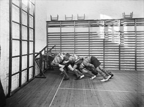 Students practicing rugby scrummaging, Launceston College, Cornwall, 1930s