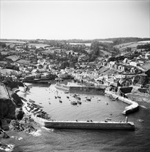 The village, Victoria Pier and the harbour, Mevagissey, Cornwall, 1953