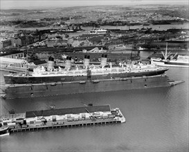 The original RMS 'Mauretania' in the floating dry dock, Southampton, Hampshire, 1933