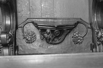Detail of misericord depicting the mermaid, Ripon Minster, North Yorkshire, 1970