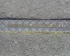 Pavement rainwater gully cover plate made by Longmead Foundry, Bath, Swindon, Wiltshire, 2006