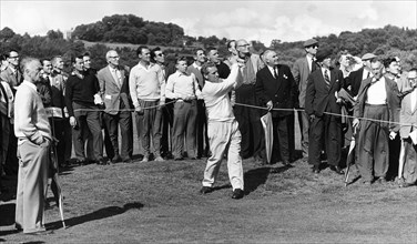 Golfer hitting a drive, 1958-1961