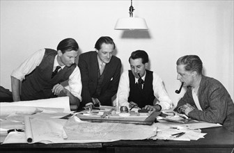 Architects and designers discussing the plans for the Festival of Britain, 1949