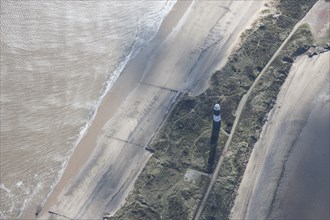 Disused lighthouse and remains of the coastal battery, Spurn Point, East Riding of Yorkshire, 2014.