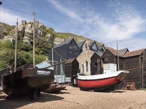 Fishing boats and net shops, Stade Beach, Hastings, East Sussex, c2010s