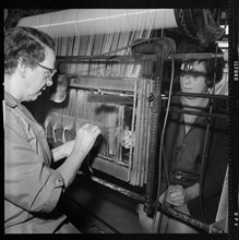 Two women weaving, 1966-1974