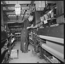 Weaver operating a Jacquard power loom, 1966-1974