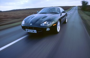 2002 Jaguar XKR coupe. Artist: Unknown.