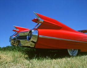 1959 Cadillac series 62 tail fins. Artist: Unknown.