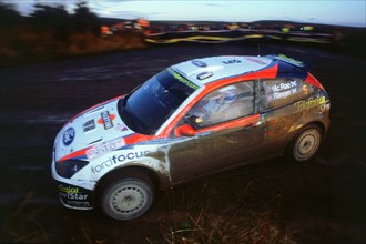 Colin McRae in Ford Focus RS WRC, Network Q rally2002. Artist: Unknown.