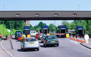 Traffic at toll booths on Itchen Bridge, Southampton. Artist: Unknown.