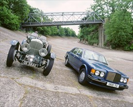1991 Bentley Turbo R and 1930 Bentley 4.5 blower at Brooklands. Artist: Unknown.