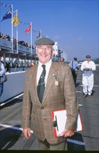 Commentator Murray Walker at 1998 Goodwood revival. Artist: Unknown.