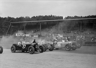 Race meeting at Donington Park, Leicestershire, 1936. Artist: Bill Brunell.