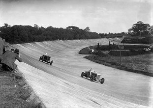 Lagonda leading GA Wooding's Talbot 95 Special, Brooklands, 15 October 1938. Artist: Bill Brunell.