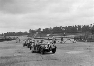 Frazer-Nash BMW 328 and Riley at the chicane, JCC Members Day, Brooklands, 1939. Artist: Bill Brunell.