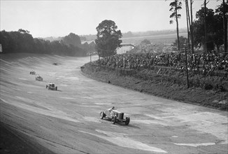 Talbot 90 on the banking at Brooklands, 1930s. Artist: Bill Brunell.