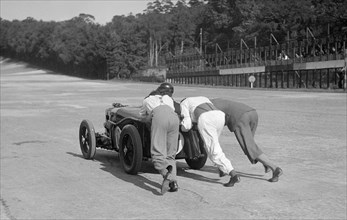 MG C type receiving a push at Brooklands, 1931 Artist: Bill Brunell.