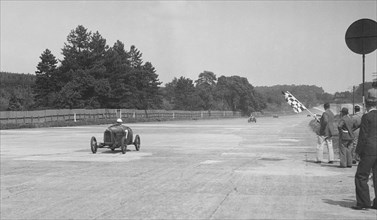 Two Salmson cars taking the chequered flag at Brooklands. Artist: Bill Brunell.