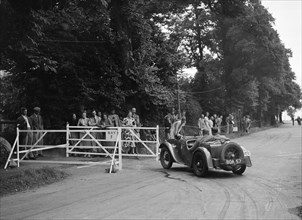 WH Scriven's Austin 7 Grasshopper, winner of a silver award at the MCC Torquay Rally, July 1937. Artist: Bill Brunell.