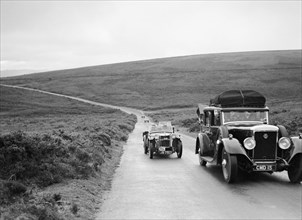 Cream Cracker Team MG PB of CAN May passing a Daimler at the MCC Torquay Rally, July 1937. Artist: Bill Brunell.