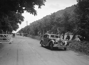 SS Stanley's Jaguar SS competing at the MCC Torquay Rally, July 1937. Artist: Bill Brunell.