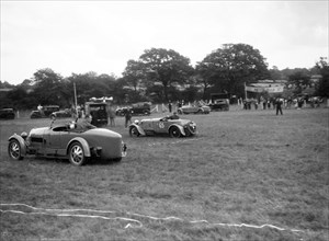 Bugatti Type 43 and Frazer-Nash Falcon taking part in the Bugatti Owners Club gymkhana, 5 July 1931. Artist: Bill Brunell.