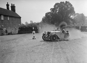 1496 cc Singer competing in the Singer CC Rushmere Hill Climb, Shropshire 1935. Artist: Bill Brunell.