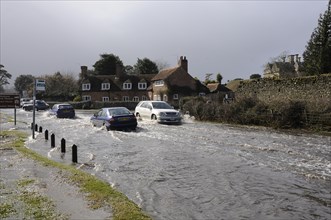 Vehicles on Flooded road at Beaulieu 2008. Artist: Unknown.
