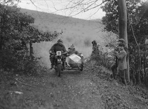 Norton and sidecar ridden by SL Grubb competing in the Inter-Varsity Trial, November 1931. Artist: Bill Brunell.