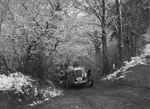 1933 MG J2 taking part in a motoring trial, late 1930s. Artist: Bill Brunell.