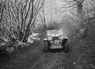 1935 MG NA Magnette taking part in a motoring trial, late 1930s. Artist: Bill Brunell.