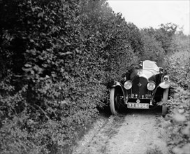 1925 Bentley of Miss MH Ogilvie taking part in the North West London Motor Club Trial, 1 June 1929. Artist: Bill Brunell.