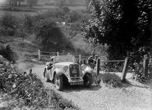 1934 Singer Le Mans taking part in a West Hants Light Car Club Trial, Ibberton Hill, Dorset, 1930s. Artist: Bill Brunell.