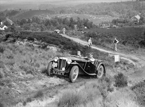 1936 MG TA taking part in the NWLMC Lawrence Cup Trial, 1937. Artist: Bill Brunell.