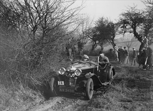 Riley of G Clifton at the Sunbac Colmore Trial, near Winchcombe, Gloucestershire, 1934. Artist: Bill Brunell.