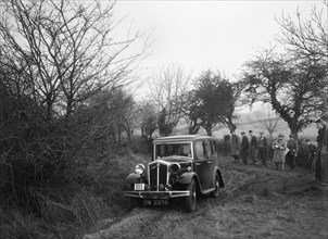 Wolseley of LL Hunt at the Sunbac Colmore Trial, near Winchcombe, Gloucestershire, 1934. Artist: Bill Brunell.